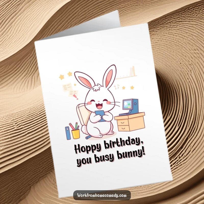 Funny Free Printable Birthday Card: Playful rabbit on video calls while tidying desk, energetic.