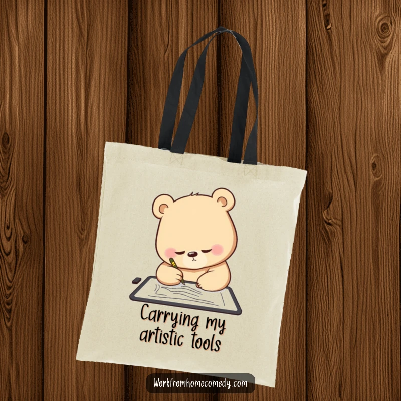 Funny Bear Tote Bag: A determined bear intently sketching on a digital tablet, a humorous and practical art accessory.